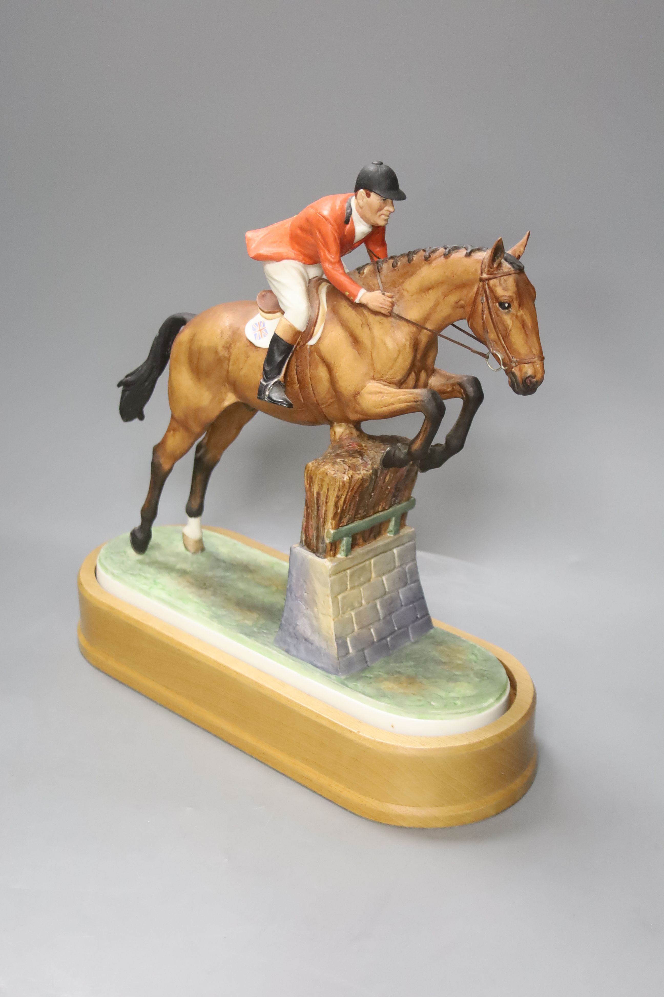 Doris Lindner for Royal Worcester, a limited edition figure, 'Foxhunter and Lt. Col. H M Llewellyn C.B.E.', no. 262/500, circa 1960, on wooden plinth, with certificate